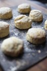 Close up of freshly baked scones on baking tray — Stock Photo