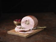 British Wiltshire ham with orange and cranberry stuffing and cranberries — Stock Photo