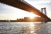 View of East river and Williamsburg Bridge, New York City, USA — Stock Photo