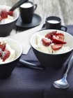 Eton mess cream covered with fresh strawberries — Stock Photo