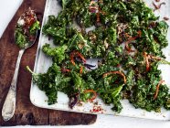 Top view of Kale, chilli and coconut side dish — Stock Photo