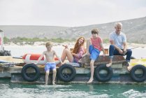 Family relaxing on houseboat sun deck, Kraalbaai, South Africa — Stock Photo