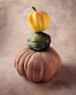Three varieties of pumpkins, stacked, still life — Stock Photo