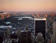 Snowy central park at sunset — Stock Photo