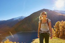 Woman hiking, looking at view, Schnalstal, South Tyrol, Italy — Stock Photo
