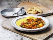 Vegetable jalfrazi with rice and parsley — Stock Photo