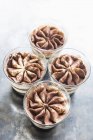 Tiramisu desserts in glasses — Stock Photo