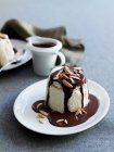 Ice cream with chocolate sauce and nuts — Stock Photo
