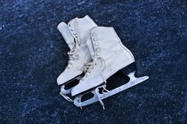 Ice skates on ice — Stock Photo