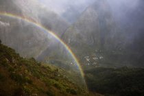 Mountain landscape with mist rainbow, Reunion Island — Stock Photo