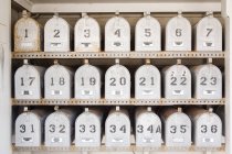 Numbered mail boxes, front view — Stock Photo