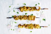 High angle view of indian spiced skewers — Stock Photo