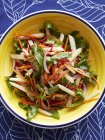 Still life with bowl of jicama salad — Stock Photo