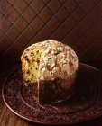 High angle view of Italian panettone on wooden board — Stock Photo