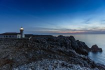 View of Punta Nati lighthouse at dusk, Menorca, Spain — Stock Photo
