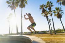 Young man exercising outdoors — Stock Photo