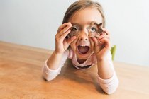 Girl playing with baking mold — Stock Photo