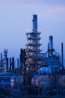 Oil and gas refinery at dusk — Stock Photo