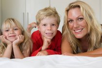 Portrait of a mother and her children — Stock Photo