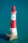 Cropped view of lighthouse in water — Stock Photo