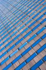 Abstract angled view of skyscraper facade — Stock Photo