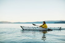 Woman kayaking on Lake Tahoe, California, USA — Stock Photo
