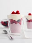 Glasses of coconut parfait dessert with berries — Stock Photo