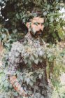 Man superimposed onto bush — Stock Photo