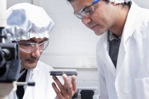 Scientists working in lab, selective focus — Stock Photo