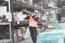 Warehouse worker, selective focus — Stock Photo