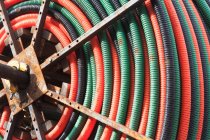 Colorful coiled hose — Stock Photo