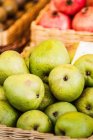 Close up shot of ripe pears in basket — Stock Photo
