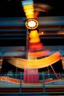 Fairground ride at night, long exposure — Stock Photo