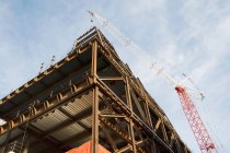 Bottom view of construction site against cloudy sky, new york city, USA — Stock Photo