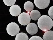 Scanning electron micrograph of silicon dioxide empty balls — Stock Photo