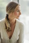 Mature blonde woman looking away, portrait — Stock Photo