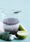 Health drink with chia seeds and lime — Stock Photo