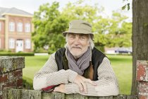 Portrait of senior man wearing hat — Stock Photo