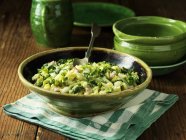 Creamed greens with cheese in bowl — Stock Photo