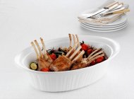 Dish of rack of lamb and vegetables — Stock Photo