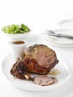 Plate of roasted lamb — Stock Photo