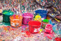 Splattered paint and pots — Stock Photo