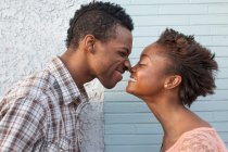 Young couple touching noses — Stock Photo