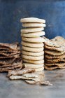 Butter biscuits and crackers on table in kitchen — Stock Photo