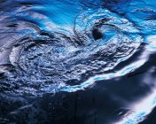 Water swirl in motion, texture background — Stock Photo