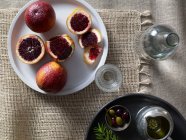 Blood oranges on plate — Stock Photo
