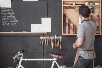 Carpenter at his workshop — Stock Photo