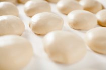 Dough balls rising — Stock Photo
