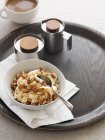 Bowl of yogurt with nuts — Stock Photo