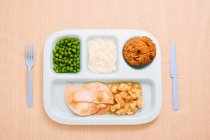 Canteen dinner in tray with cutlery served on table — Stock Photo